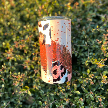 A 14oz fatty stainless steel tumbler with red stars, sparkles, and cheetah prints.  This tumbler includes a silicone bottom, leakproof top, metal straw and straw cleaner. Back view.